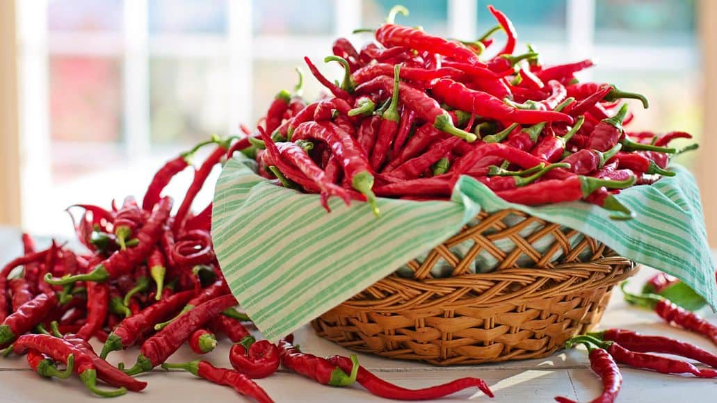 cayenne peppers in basket